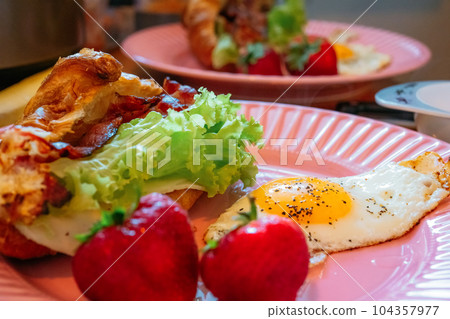 Healthy breakfast served on a pink plate 104357977