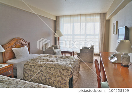 [Hotel room image] 104358599