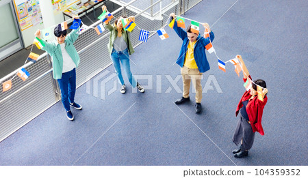 multinational people with bunting flags 104359352