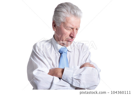 close up portrait of senior businessman in formal wear posing close up portrait of senior businessman in formal wear posing 104360111