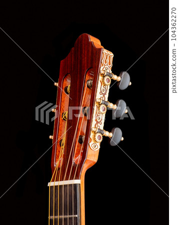 close up shot of  classical guitar tuning machine , open gear, Selective Focus 104362270