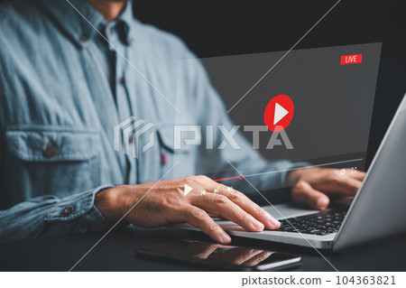 Laptop streaming online videos and tutorials. Conceptual image showcasing the seamless experience of digital content consumption. Unlock a wealth of knowledge and entertainment. Laptop streaming online videos and tutorials. Conceptual image showcasing the seamless experience of digital content consumption. Unlock a wealth of knowledge and entertainment. 104363821