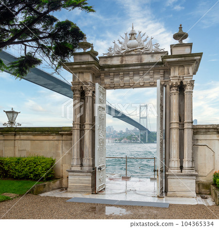 Marble gate with decorated door leading to sea, with Bosphorus Bridge in the background, Beylerbeyi Palace, Istanbul Marble gate with decorated door leading to sea, with Bosphorus Bridge in the background, Beylerbeyi Palace, Istanbul 104365334