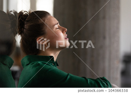 Young exhausted woman in office, having problem. Young exhausted woman in office, having problem. 104366338