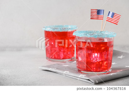 Patriotic red pomegranate margarita for July 4th. 104367816