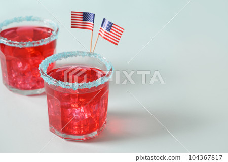 Patriotic red pomegranate margarita for July 4th. Patriotic red pomegranate margarita for July 4th. 104367817