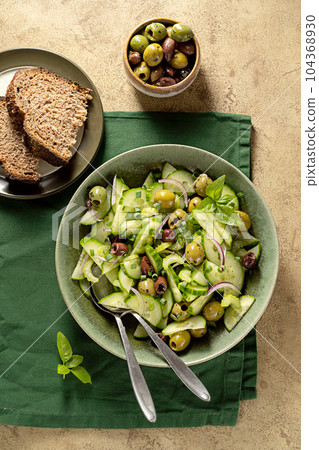 Green salad with olives and sourdough bread slices Green salad with olives and sourdough bread slices 104368930
