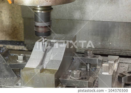 The CNC milling machine cutting press part with ball end mill tool. The CNC milling machine cutting press part with ball end mill tool. 104370300