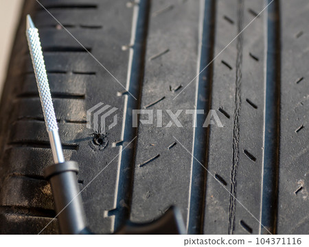 Reaming tool used to scarify and enlarge a tire puncture before inserting a repair plug Reaming tool used to scarify and enlarge a tire puncture before inserting a repair plug 104371116