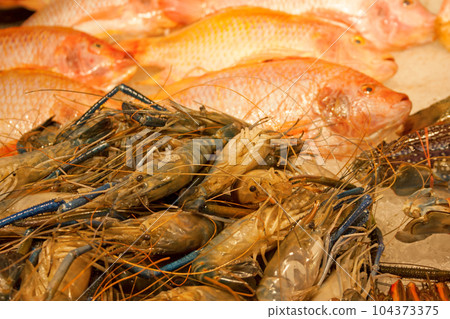 Stack of seafood for sale Stack of seafood for sale 104373375