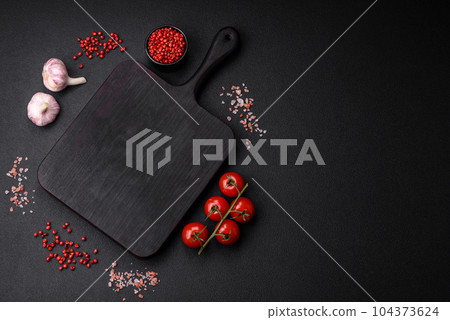 Ingredients for cooking cherry tomatoes, salt, spices and herbs Ingredients for cooking cherry tomatoes, salt, spices and herbs 104373624