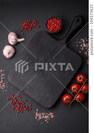 Ingredients for cooking cherry tomatoes, salt, spices and herbs 104373625