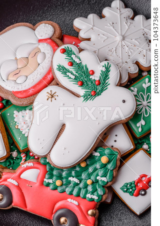 Beautiful Christmas or New Year colorful homemade gingerbread cookies Beautiful Christmas or New Year colorful homemade gingerbread cookies 104373648