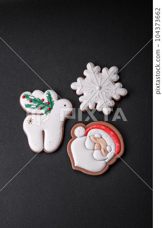 Beautiful Christmas or New Year colorful homemade gingerbread cookies Beautiful Christmas or New Year colorful homemade gingerbread cookies 104373662