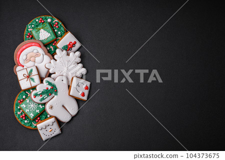 Beautiful Christmas or New Year colorful homemade gingerbread cookies 104373675