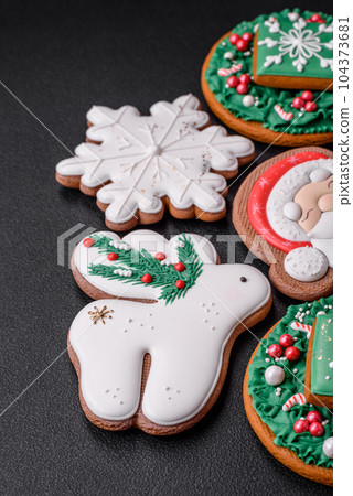 Beautiful Christmas or New Year colorful homemade gingerbread cookies 104373681
