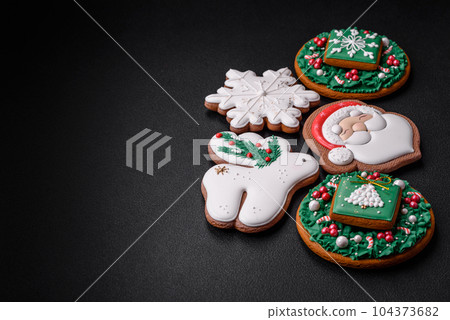 Beautiful Christmas or New Year colorful homemade gingerbread cookies 104373682