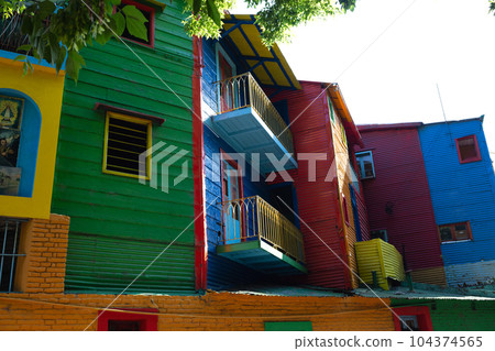 beautiful bright colorful and authentic facades of houses in the La Boca area of Buenos Aires 104374565