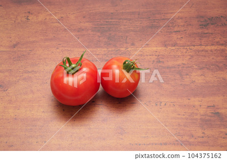 Summer vegetables (tomatoes) wooden table background Summer vegetables (tomatoes) wooden table background 104375162