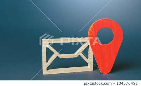 Envelope and red geolocation map pin. Messages and notifications with a geographic context. Staying connected and informed. Receive real-time updates, alerts, and important information. 104376458