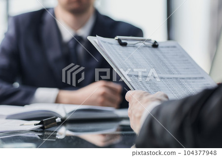 Business team analyzing income charts. Close up.Business analysis and strategy concept. Business team analyzing income charts. Close up.Business analysis and strategy concept. 104377948
