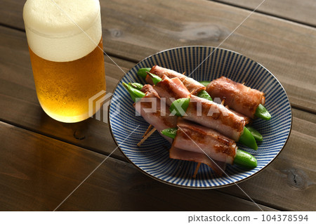 Snap peas wrapped in bacon 104378594