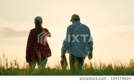 business partners field sunset, agriculture, farming farm, successful farmer tells worker, land partnership agronomists, produce grow organic plants, farmers cooperation agriculture, eco industry business partners field sunset, agriculture, farming farm, successful farmer tells worker, land partnership agronomists, produce grow organic plants, farmers cooperation agriculture, eco industry 104379020