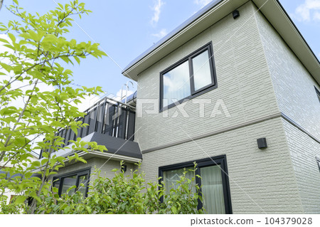 Completion of house renovation House wall after exterior wall painting 104379028