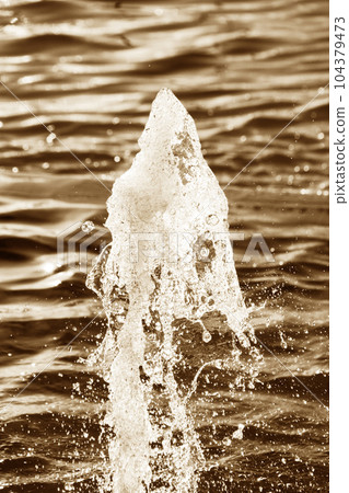Splashes of the fountain Splashes of the fountain 104379473