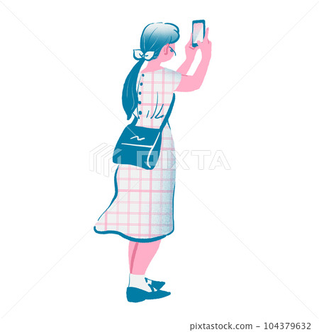 A young woman taking a picture with a smartphone 104379632