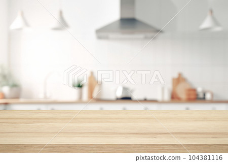 Empty Wood table top on blurred kitchen background.. Empty Wood table top on blurred kitchen background.. 104381116
