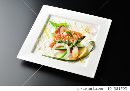 Salmon carpaccio / creative cuisine with beautiful colors / black background Salmon carpaccio / creative cuisine with beautiful colors / black background 104381705