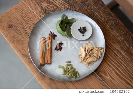 Chai ingredients in a bowl 104382562