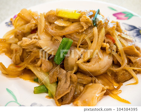 stir-fry pork with green onions stir-fry pork with green onions 104384395