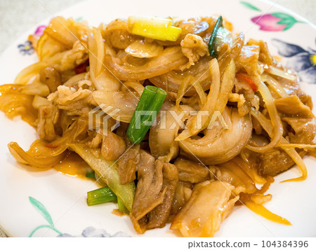 stir-fry pork with green onions stir-fry pork with green onions 104384396