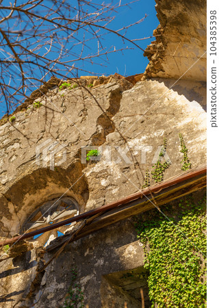 Abandoned old catholic church, damaged by the earthquake in 1979 in the town of Prcanj Montenegro 104385398