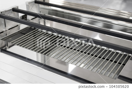 Brand new commercial grill in the kitchen Brand new commercial grill in the kitchen 104385620