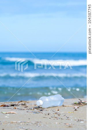 Plastic bottles washed up on the beach | Marine garbage image | Coastal cleaning image Plastic bottles washed up on the beach | Marine garbage image | Coastal cleaning image 104387745