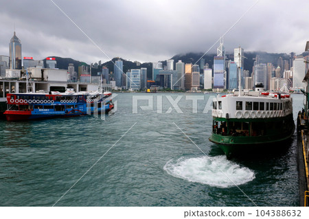 Star ferry sailing through Victoria Bay in Hong Kong Star ferry sailing through Victoria Bay in Hong Kong 104388632