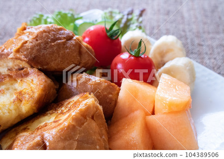 Fluffy French toast plate made from baguette 104389506