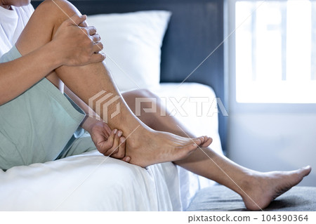 Asian middle aged man suffering from shin splints or medial tibial stress syndrome and achilles tendinitis,inflammation of muscle,acute pain in shin and leg caused by prolonged running,physical injury Asian middle aged man suffering from shin splints or medial tibial stress syndrome and achilles tendinitis,inflammation of muscle,acute pain in shin and leg caused by prolonged running,physical injury 104390364