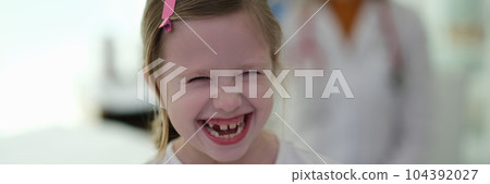 Little funny girl laughing at doctor appointment at clinic Little funny girl laughing at doctor appointment at clinic 104392027