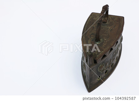 Beautifully shaped antique iron 104392587