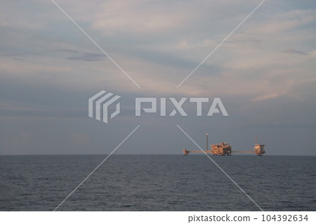 Offshore construction platform for production oil and gas. Oil and gas industry and hard work. Production platform and operation process by manual and auto function from control room. Offshore construction platform for production oil and gas. Oil and gas industry and hard work. Production platform and operation process by manual and auto function from control room. 104392634
