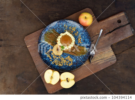 Apple tart with fresh apples on wooden table 104394114