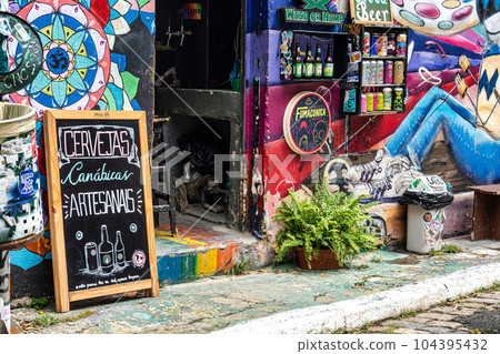 Beco do Batman in Sao Paulo, Brazil is a popular tourist destination because of the graffiti that line the streets 104395432