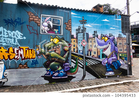 Beco do Batman in Sao Paulo, Brazil is a popular tourist destination because of the graffiti that line the streets Beco do Batman in Sao Paulo, Brazil is a popular tourist destination because of the graffiti that line the streets 104395433