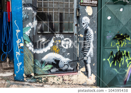 Beco do Batman in Sao Paulo, Brazil is a popular tourist destination because of the graffiti that line the streets Beco do Batman in Sao Paulo, Brazil is a popular tourist destination because of the graffiti that line the streets 104395438