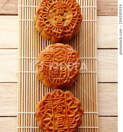 Mooncake, Chinese mid-autumn festival food for the Dessert Concept. Mooncake, Chinese mid-autumn festival food for the Dessert Concept. 104395914