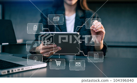 Businessman hand working digital marketing media in virtual screen with mobile phone and modern compute with VR icon diagram at office Businessman hand working digital marketing media in virtual screen with mobile phone and modern compute with VR icon diagram at office 104396840